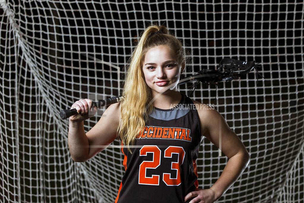 Sam Lee This photo provided by Occidental College shows lacrosse player Julia Shwayder in 2022. Julia Shwayder and Breyon Jackson’s battles to overcome adversity throughout their college careers as well as serving as an example for others have been recognized. Shwayder and Jackson, a basketball player at San Francisco State University, are the recipients of the first CalHOPE Courage Award. (Sam Leigh/Occidental College via AP)