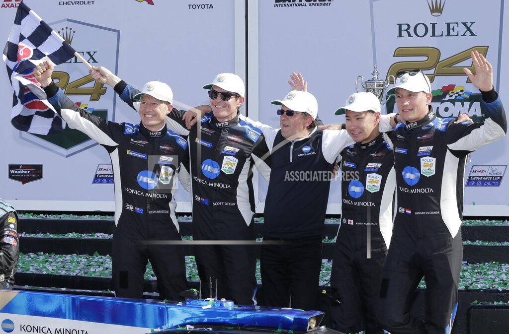 Terry Renna From left to right, Konica Minolta Cadillac DPi-V.R drivers and team owner Ryan Briscoe, Scott Dixon, Wayne Taylor, Kamui Kobayashi and Renger van der Zande celebrate in Victory Lane after winning the Rolex 24-hour auto race at Daytona International Speedway, Sunday, Jan. 26, 2020, in Daytona Beach, Fla. (AP Photo/Terry Renna)