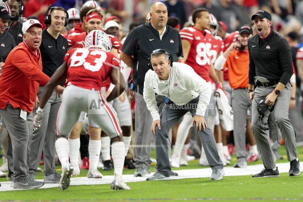 Aj Mast Ohio State head coach Urban Meyer celebrates a touchdown reception by wide receiver Terry McLaurin (83) during the first half of the Big Ten championship NCAA college football game against Northwestern, Saturday, Dec. 1, 2018, in Indianapolis. (AP Photo/AJ Mast)