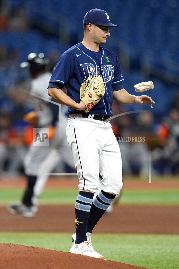 Chris O'MEara Tampa Bay Rays starting pitcher Shane McClanahan bounced the rosin bag off his hand as Detroit Tigers' Jeimer Candelario runs around the bases after his solo home run during the fifth inning of a baseball game Tuesday, May 17, 2022, in St. Petersburg, Fla. (AP Photo/Chris O'Meara)