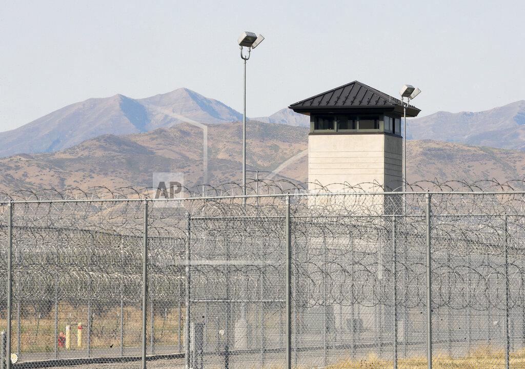 This photo shows a guard tower at the Utah State Prison, Monday, Sept, 14, 2020 in Draper, Utah. John Emery Blanchard is up for parole 25 years after his ex-wife's brutal murder, but his grown children are divided on whether he should be released from prison. (Scott G. Winterton/The Deseret News via AP)