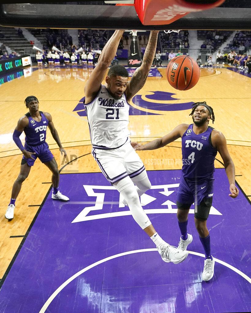 Charlie Riedel Kansas State forward Davion Bradford (21) dunks the ball during the second half of an NCAA college basketball game against TCU Wednesday, Jan. 12, 2022, in Manhattan, Kan. TCU won 60-57. (AP Photo/Charlie Riedel)