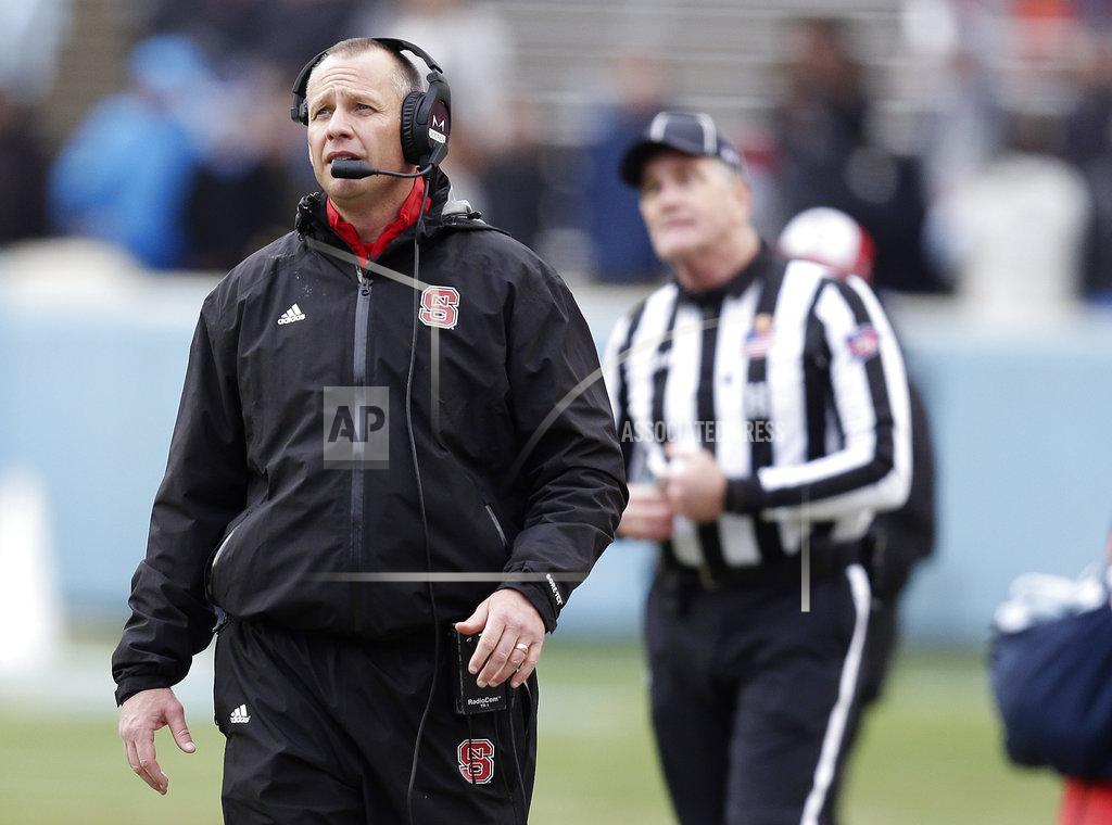 Gerry Broome North Carolina State head coach Dave Doeren works the sidelines during the second half of an NCAA college football game against North Carolina in Chapel Hill, N.C., Saturday, Nov. 24, 2018. North Carolina State won 34-28 in overtime. (AP Photo/Gerry Broome)