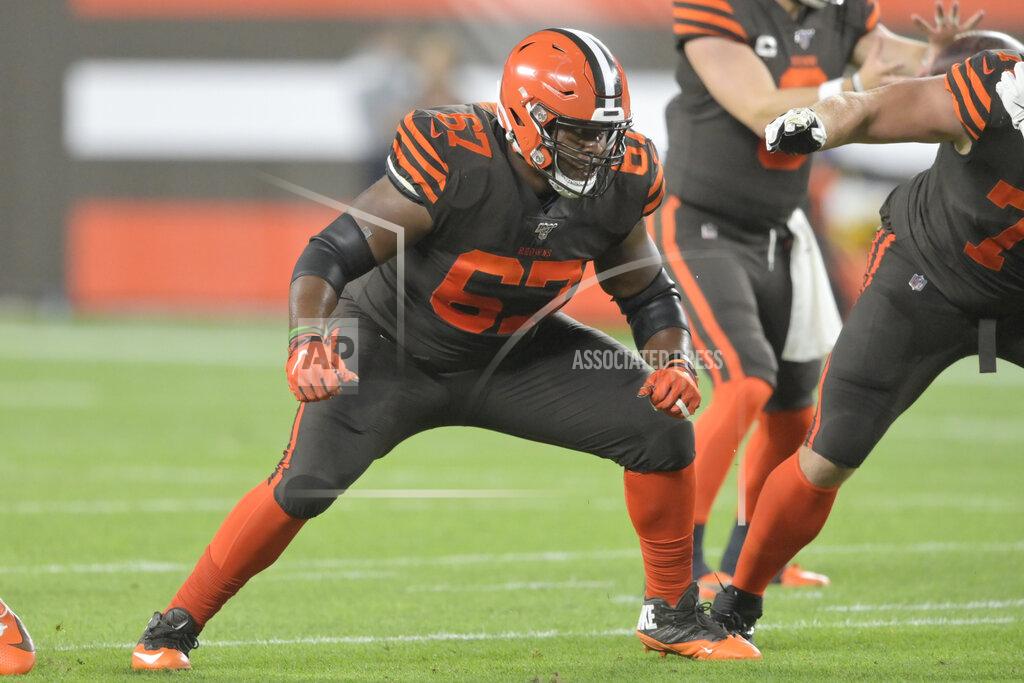 David Richard FILE - In this Sept. 22, 2019, file photo, Cleveland Browns guard Justin McCray (67) blocks during an NFL football game against the Los Angeles Rams in Cleveland. Browns starting left offensive tackle Greg Robinson has been benched. It’s likely that he will be replaced by Justin McCray, who has not started an NFL game at left tackle and has played their sparingly during his career. (AP Photo/David Richard, File)