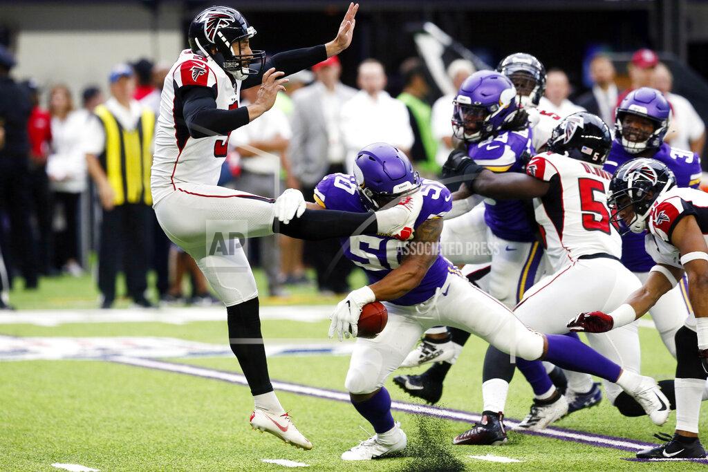 Jim Mone Minnesota Vikings linebacker Eric Wilson (50) blocks a punt by Atlanta Falcons punter Matt Bosher, left, during the first half of an NFL football game, Sunday, Sept. 8, 2019, in Minneapolis. (AP Photo/Jim Mone)