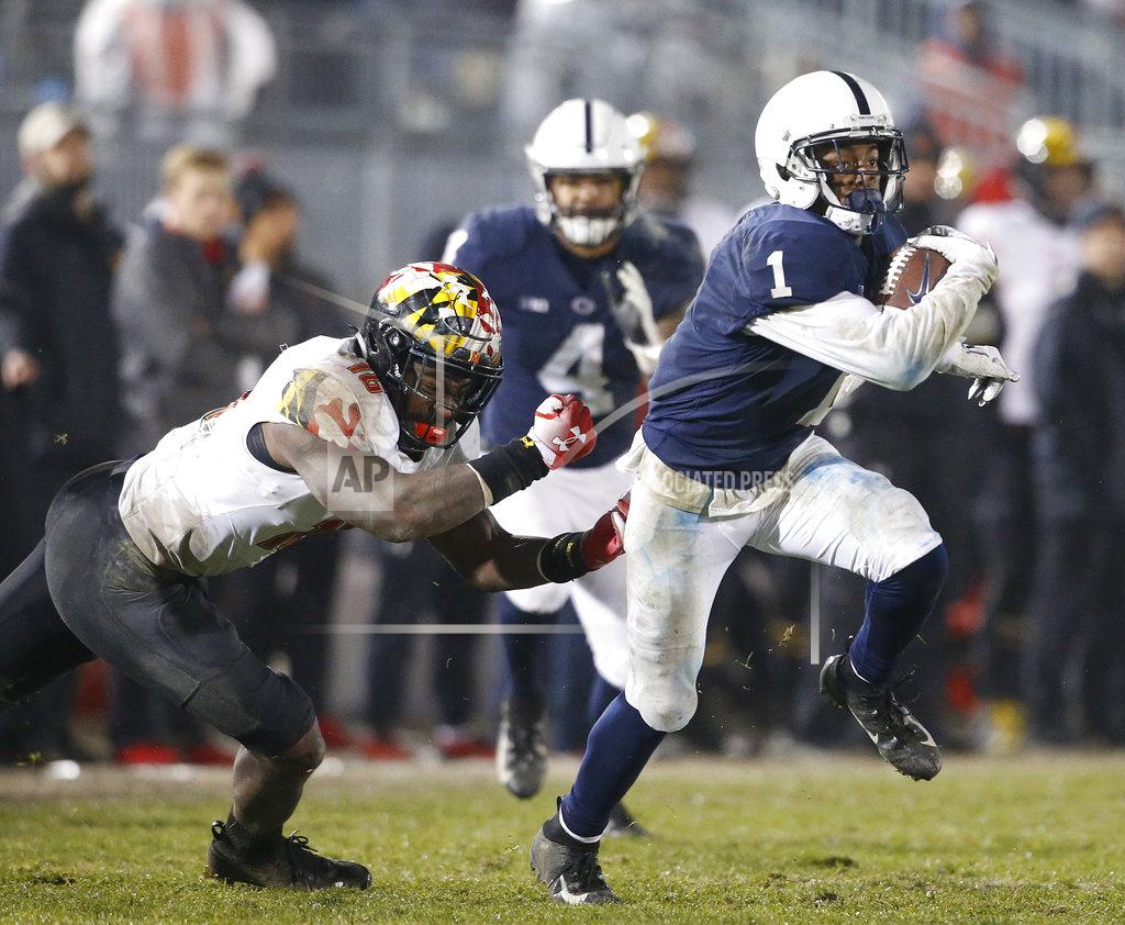 Chris Knight Penn State's KJ Hamler (1) gets past Maryland's Ayinde Eley (16) after a catch during the second half of an NCAA college football game in State College, Pa., Saturday, Nov. 24, 2018. Penn State won 38-3. (AP Photo/Chris Knight)