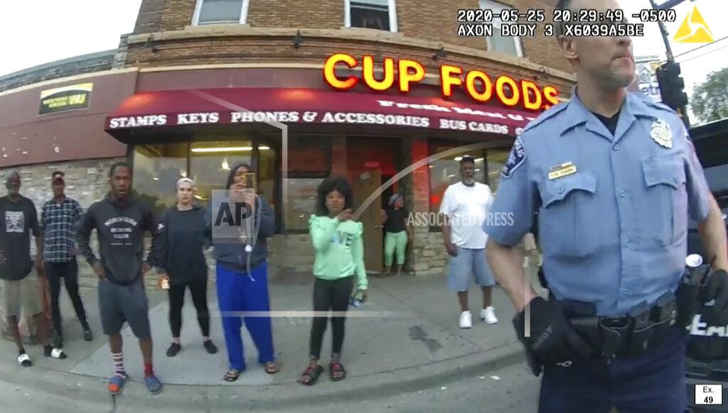 Uncredited In this image from police body camera video former Minneapolis police Officer Derek Chauvin stands outside Cup Foods in Minneapolis, on May 25, 2020, with a crowd of onlookers behind him. The image was shown as prosecutor Steve Schleicher gave closing arguments as Hennepin County Judge Peter Cahill presided Monday, April 19, 2021, at the Hennepin County Courthouse in Minneapolis, in the trial of Chauvin who is charged in the May 25 death of George Floyd. (Court TV via AP, Pool)