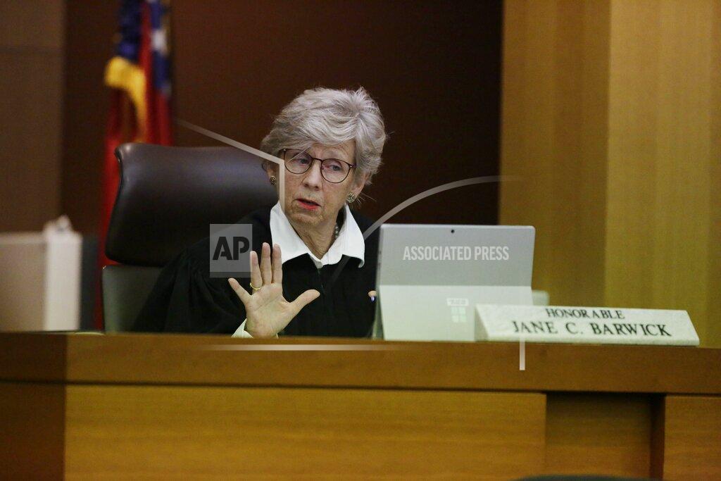 Brynn Anderson Judge Jane C. Barwick speaks during a bond hearing for former Atlanta police officer Garrett Rolfe who appears on a television screen on Tuesday, June 30, 2020, in Atlanta. Rolfe, who fatally shot Rayshard Brooks can be free on bond while his case is pending. A judge set a bond of $500,000 for Rolfe, who faces charges including felony murder in the killing of the 27-year-old Black man. Rolfe fatally shot Brooks in the back when Brooks fired a Taser in his direction while running away after a struggle on June 12. (AP Photo/Brynn Anderson, Pool)