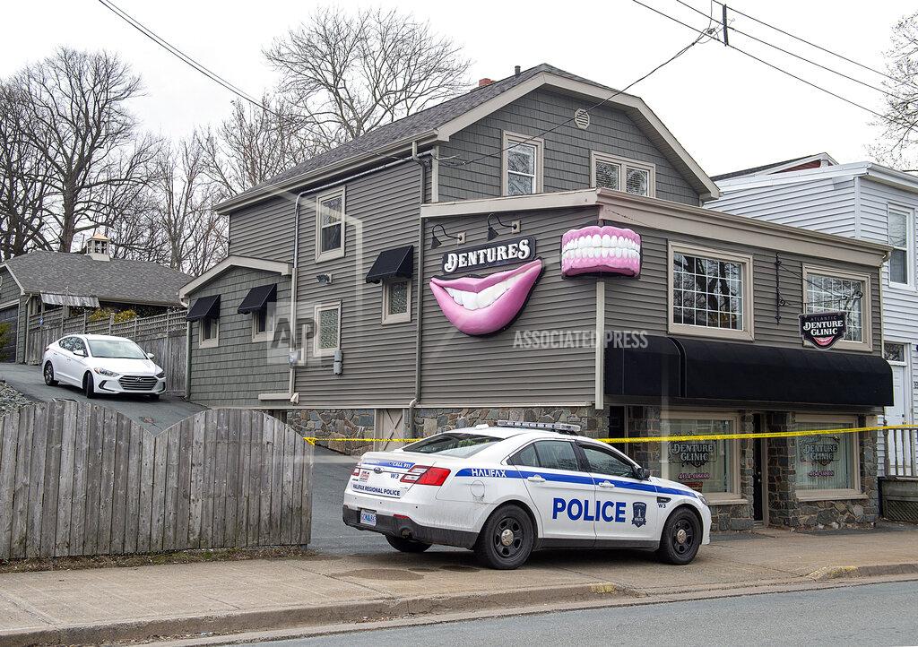 Andrew Vaughan The Atlantic Denture Clinic, owned by Gabriel Wortman, is guarded by police in Dartmouth, Nova Scotia, on Monday, April 20, 2020. Wortman, a gunman disguised as a police officer went on a 12-hour rampage in the Canadian province beginning late Saturday, shooting people in their homes, setting fires and killing multiple people, including a policewoman, in the deadliest such attack in the country’s history. (Andrew Vaughan/The Canadian Press via AP)