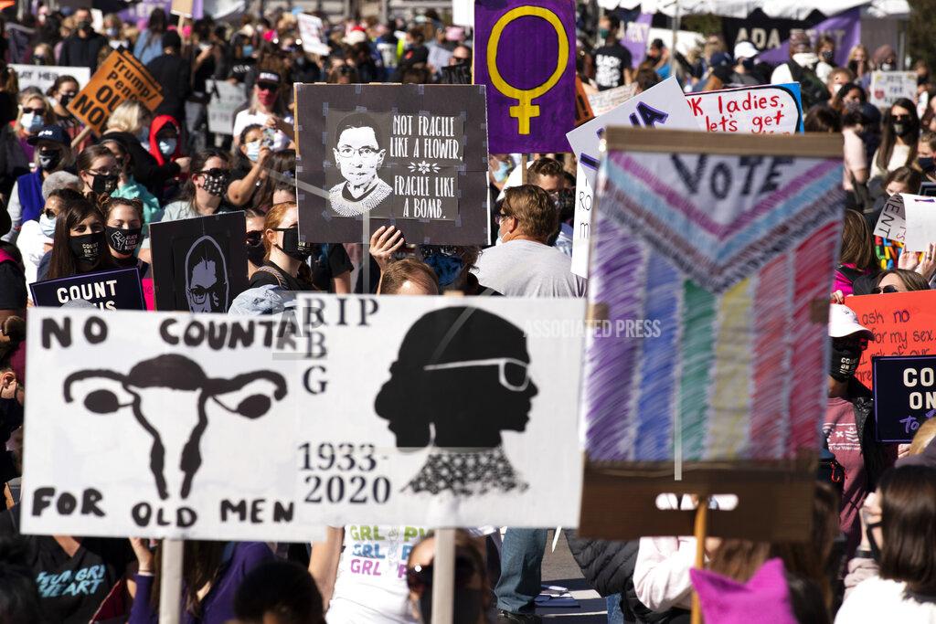 Jose Luis Magana Demonstrators rally during the Women's March at Freedom Plaza, Saturday, Oct. 17, 2020, in Washington. (AP Photo/Jose Luis Magana)