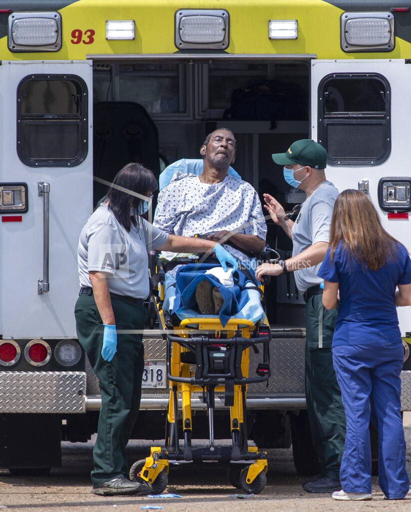 Chris Granger Emergency personnel evacuate people at a mass shelter Thursday, Sept. 2, 2021 in Independence, La. Multiple nursing home residents died after Hurricane Ida, but full details of their deaths are unknown because state health inspectors said Thursday that they were turned away from examining conditions at the facility to which they had been evacuated. (Chris Granger/The Times-Picayune/The New Orleans Advocate via AP)