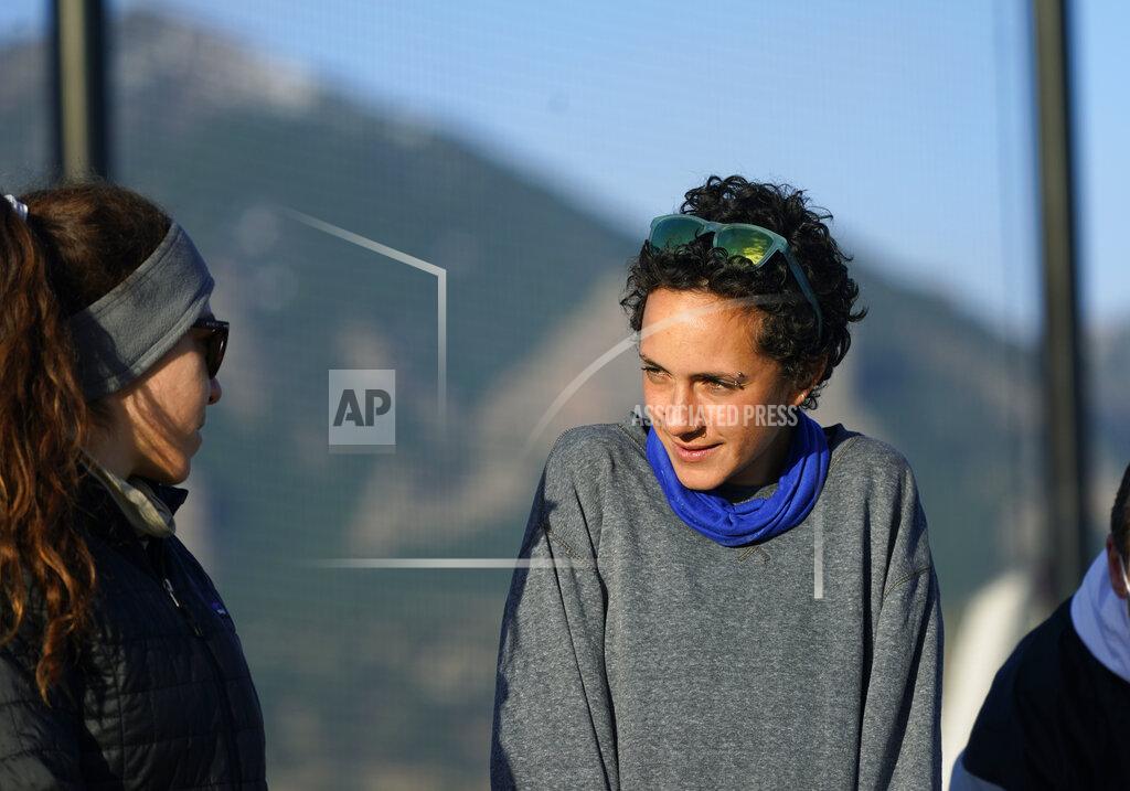 David Zalubowski Olympic hopeful Maggie Montoya is shown as she trains with fellow runners at a park on the east side of Boulder, Colo., Friday, April 9, 2021. Maggie Montoya called her mom and dad to say she loved them from a conference room as she waited out the Boulder shooting ordeal. The Olympic hopeful was working in the pharmacy at the King Soopers supermarket in Colorado on March 22 when 10 people were killed in the mass shooting. (AP Photo/David Zalubowski)