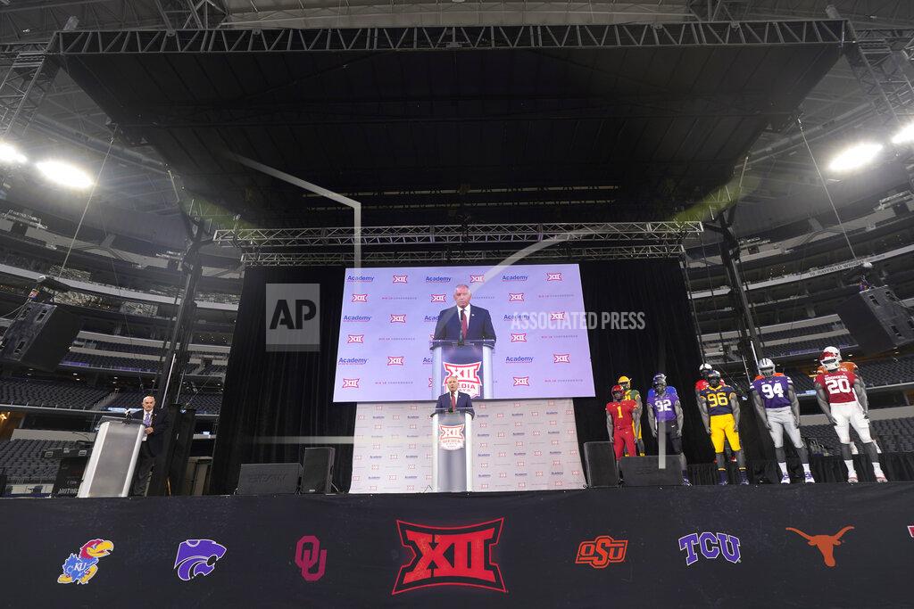 Lm Otero CORRECTS DATELINE TO ARLINGTON, TEXAS, NOT DALLAS AS ORIGINALLY SENT - Big 12 commissioner Bob Bowlsby, center, speaks during NCAA college football Big 12 media days Wednesday, July 14, 2021, in Arlington, Texas. (AP Photo/LM Otero)