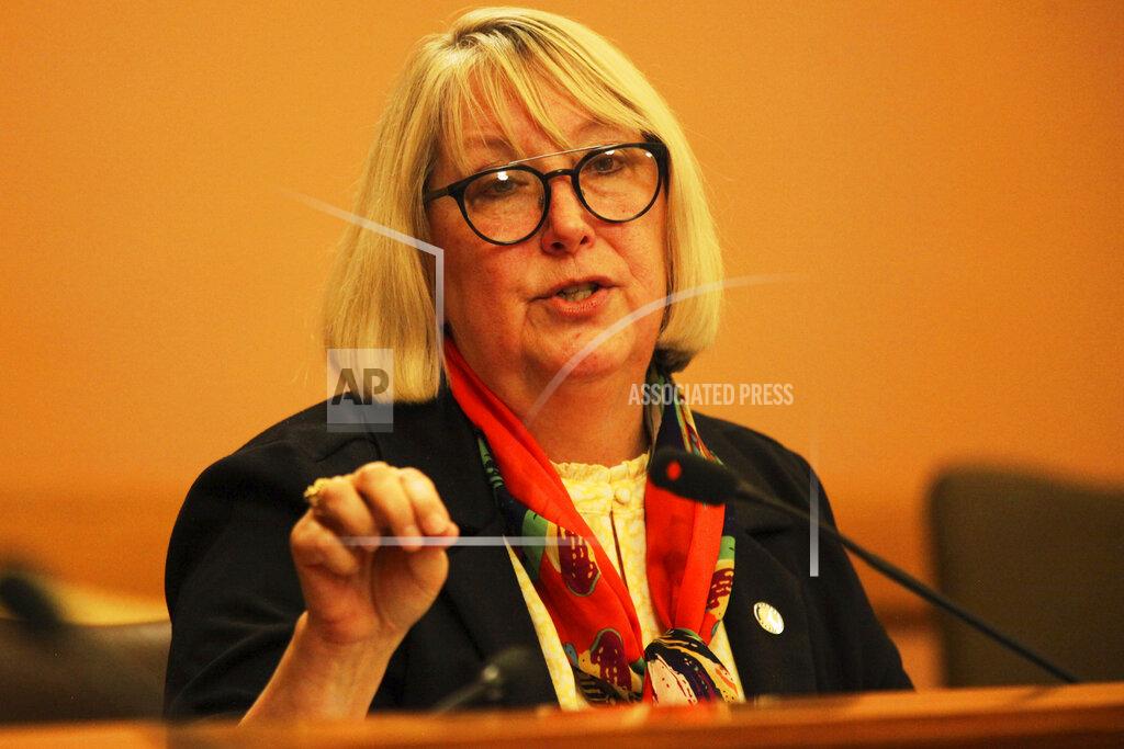 John Hanna Kansas Senate Education Committee Chair Molly Baumgardner, R-Louisburg, explains a bipartisan education funding and policy measure to fellow GOP senators during a caucus meeting, Friday, May 7, 2021, at the Statehouse in Topeka, Kan. The measure boosts funding on public schools but also expands a program that provides private-school scholarships for some students. (AP Photo/John Hanna)