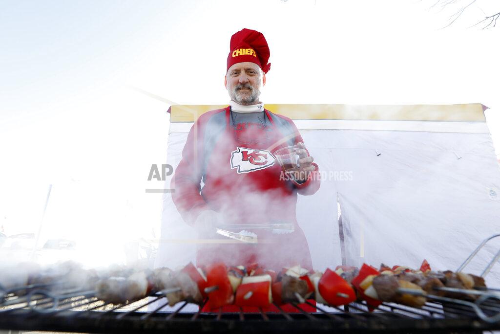 Charlie Neibergall Patrick Morries tailgates before the NFL AFC Championship football game between the Kansas City Chiefs and the Tennessee Titans Sunday, Jan. 19, 2020, in Kansas City, MO. (AP Photo/Charlie Neibergall)