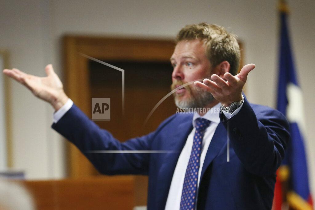 Briana Sanchez Wesley Ball tells jurors the scales are imbalanced when it comes to evidence provided while giving closing arguments Friday, Aug. 5, 2022, at the Travis County Courthouse in Austin, Texas. Jurors were asked to assess punitive damages against InfoWars host Alex Jones after awarding $4.1 million in actual damages to the parents of Jesse Lewis on Thursday. (Briana Sanchez/Austin American-Statesman via AP, Pool)