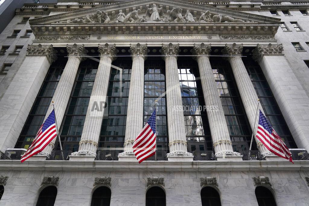 Seth Wenig FILE - In this Nov. 23, 2020 file photo, the New York Stock Exchange is seen in New York. Stocks are off to a mixed start on Wall Street as gains for several big technology companies offset losses in banks and other parts of the market. The S&P 500 index is coming off its first weekly loss in three weeks. (AP Photo/Seth Wenig, File)