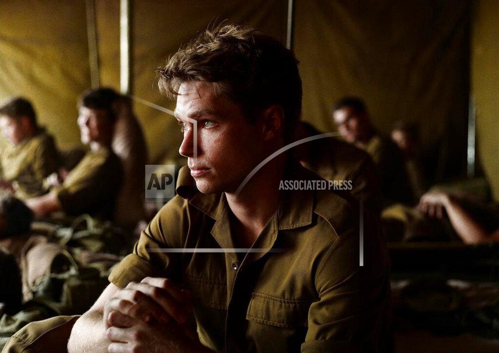 Uncredited This image released by IFC Films shows Kai Luke Brummer in a scene from "Moffie." (IFC Films via AP)