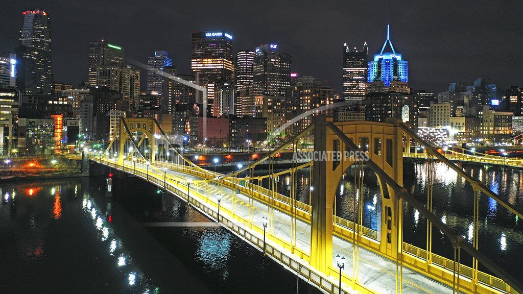 Gene J. Puskar This Nov. 26, 2020 file photo shows the newly refurbished Rachel Carson Bridge over the Allegheny River in downtown Pittsburgh. President Joe Biden wants $2 trillion to reengineer America’s infrastructure and expects the nation’s corporations to pay for it. The Democratic president travels to Pittsburgh on Wednesday, March 31, 2021 to unveil what would be a hard-hatted transformation of the U.S. economy.(AP Photo/Gene J. Puskar/File)
