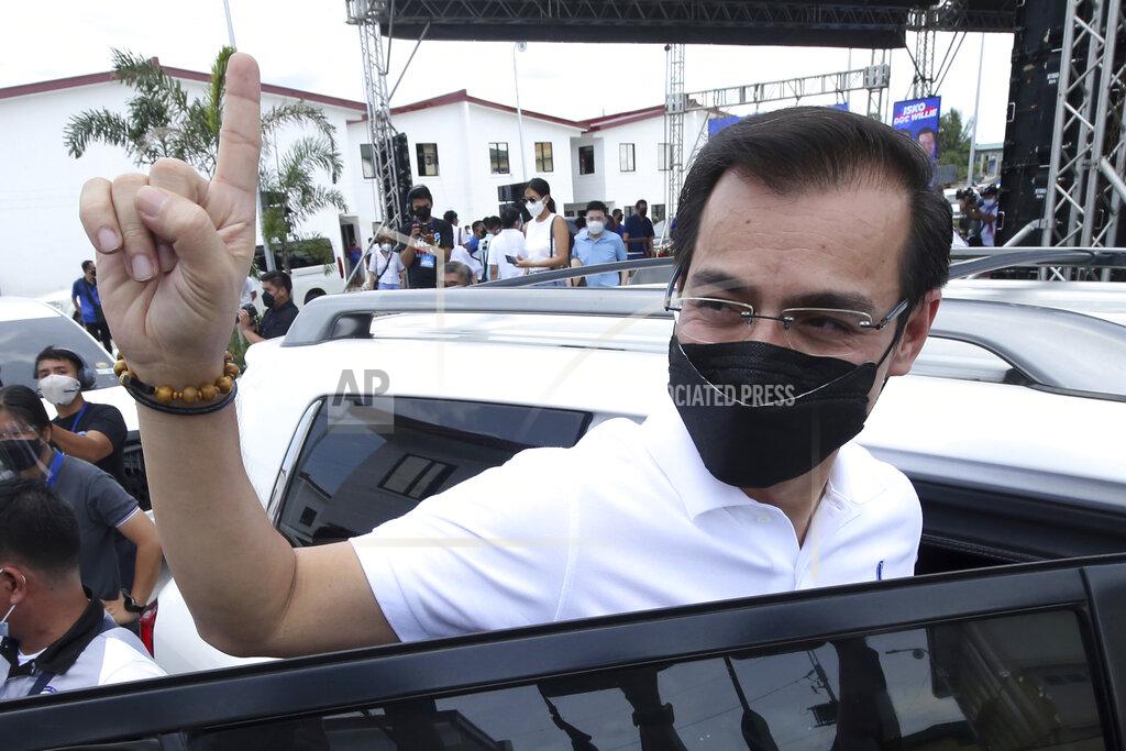Uncredited Manila Mayor Isko Moreno gestures after declaring his bid to run for president in a speech at a public school in the slum area near the place where he grew up in Manila, Philippines on Wednesday Sept. 22, 2021. The popular mayor of the Philippine capital said Wednesday he will run for president in next year's elections, the latest aspirant in what is expected to be a crowded race to succeed the controversial Rodrigo Duterte. (AP Photo)