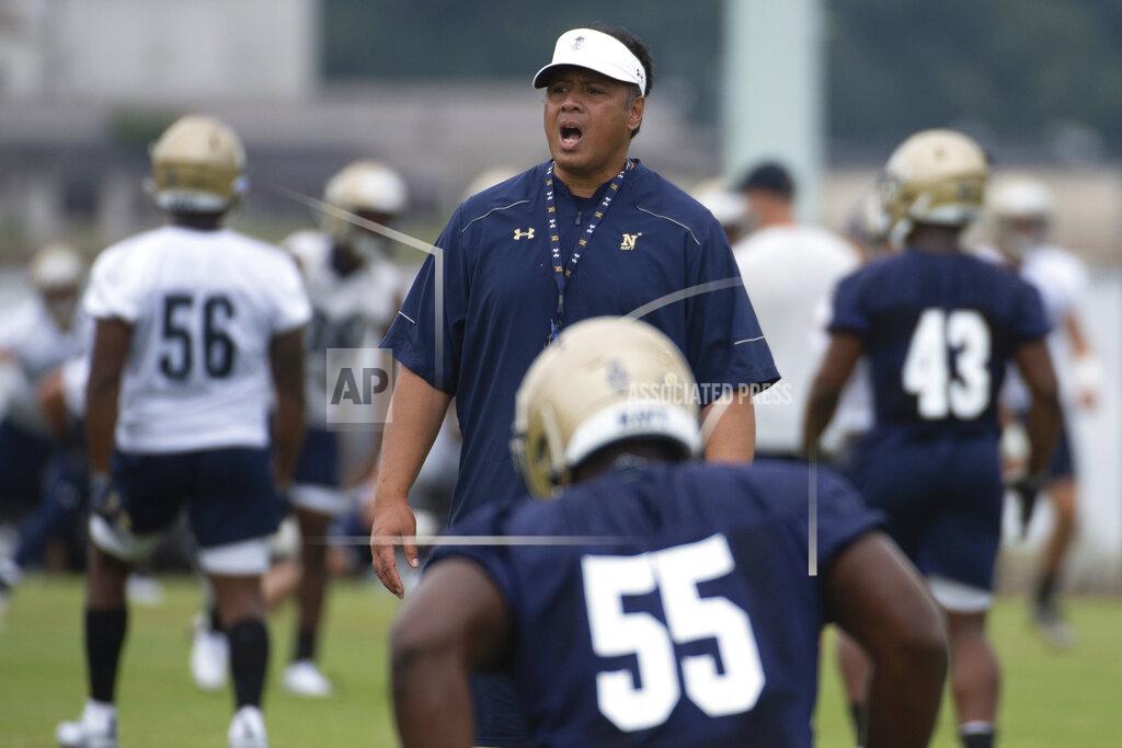 Tommy Gilligan FILE - In this Aug. 2, 2019, file photo, Navy head coach Ken Niumatalolo gives direction to the team during NCAA college football training camp in Annapolis, Md. Niumatalolo decided to make some drastic changes after last year’s disappointing season. (AP Photo/Tommy Gilligan, File)