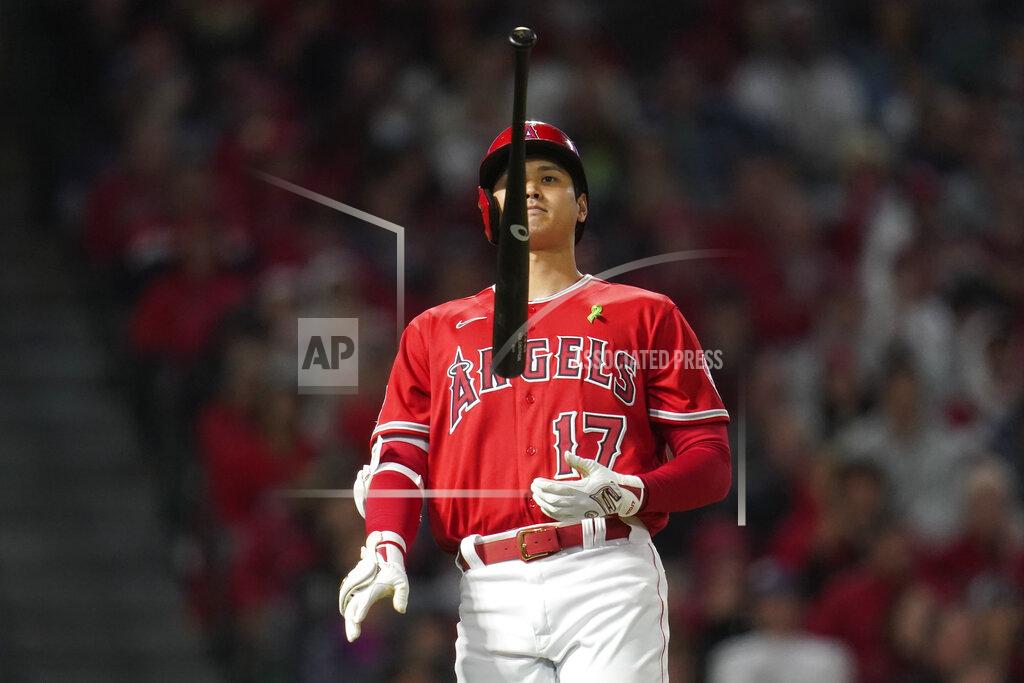 Ashley Landis Los Angeles Angels designated hitter Shohei Ohtani (17) flips a bat after hitting a foul ball during the seventh inning of a baseball game against the Tampa Bay Rays in Anaheim, Calif., Tuesday, May 10, 2022. (AP Photo/Ashley Landis)