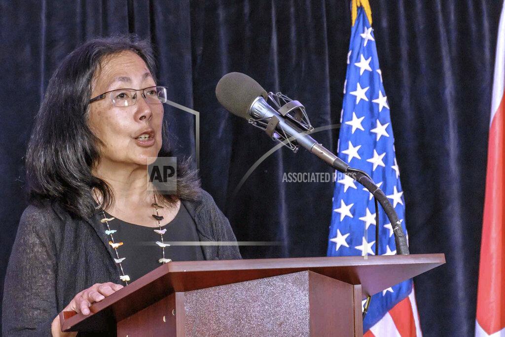 George Mackenzie Voice of America Deputy Director Sandy Sugawara speaks during her swearing-in ceremony on May 2, 2016, in Washington. Amanda Bennett, the director of Voice of America and her deputy Sandy Sugawara resigned Monday, June 15, 2020, following recent clashes with the Trump administration. The pair announced they were leaving the organization as Trump ally and conservative filmmaker Michael Pack takes over leadership of the agency that oversees VOA. (George Mackenzie/Voice of America via AP)