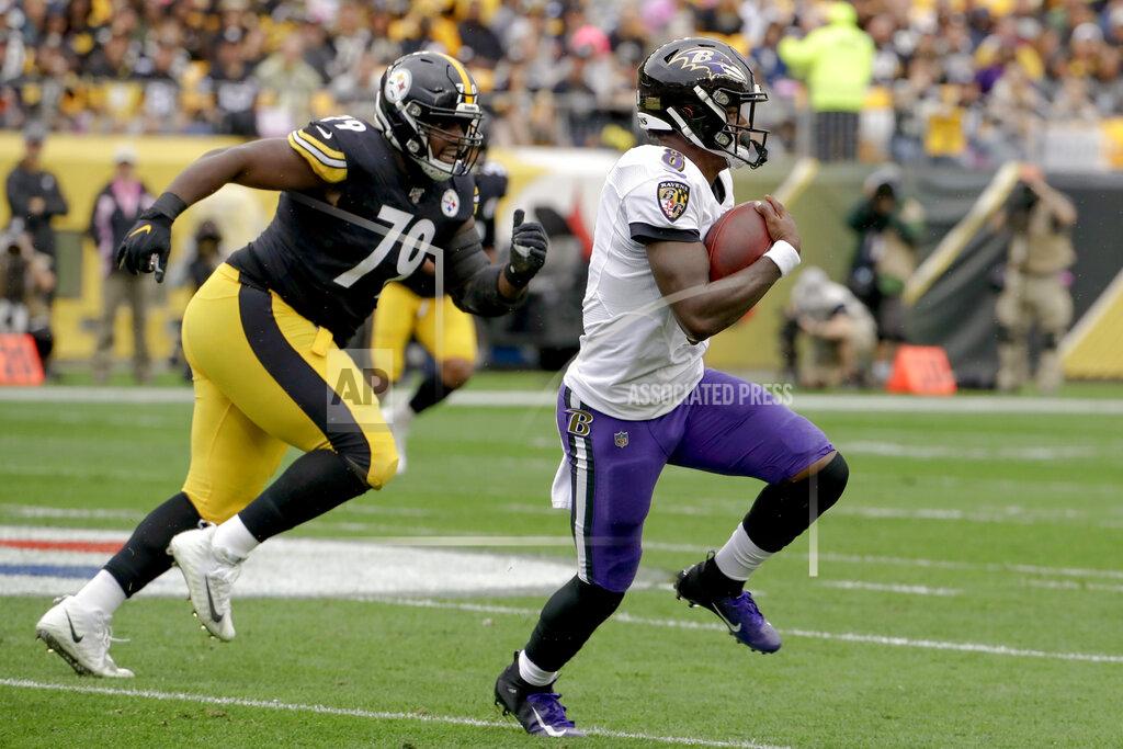 Don Wright Baltimore Ravens quarterback Lamar Jackson (8) scrambles away from Pittsburgh Steelers nose tackle Javon Hargrave (79) in the first half of an NFL football game, Sunday, Oct. 6, 2019, in Pittsburgh. (AP Photo/Don Wright)