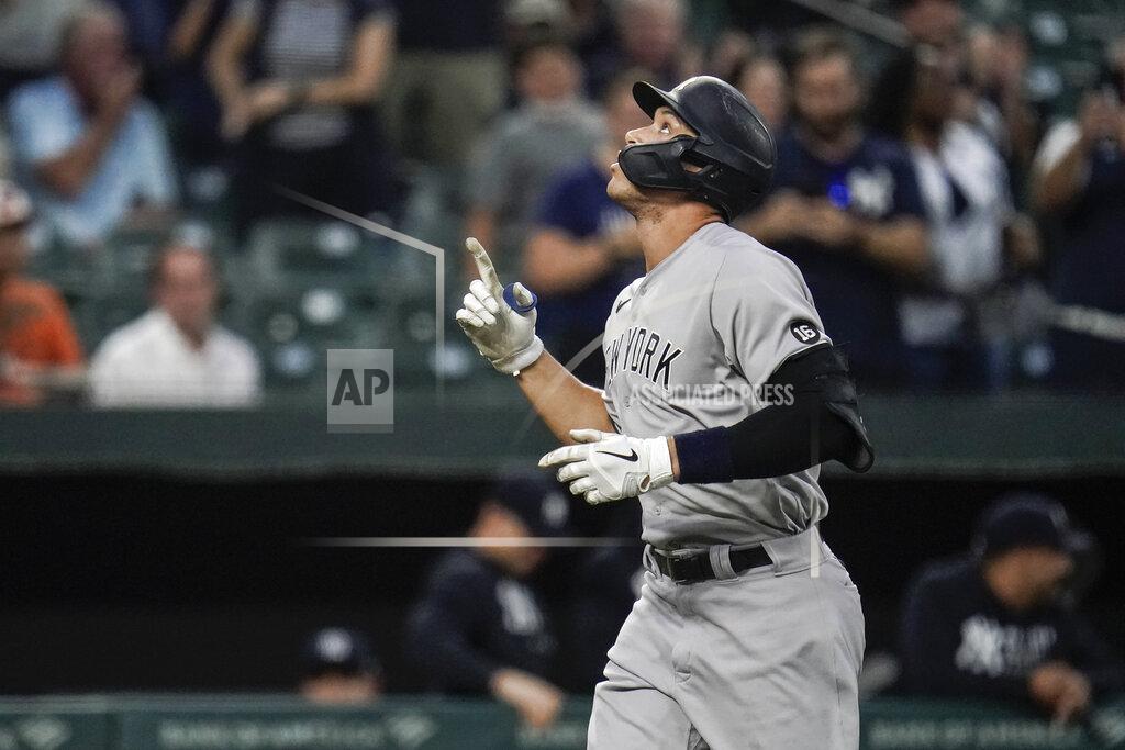 Julio Cortez New York Yankees' Aaron Judge gestures after hitting a two-run home run off Baltimore Orioles starting pitcher Alexander Wells during the first inning of a baseball game, Tuesday, Sept. 14, 2021, in Baltimore. (AP Photo/Julio Cortez)