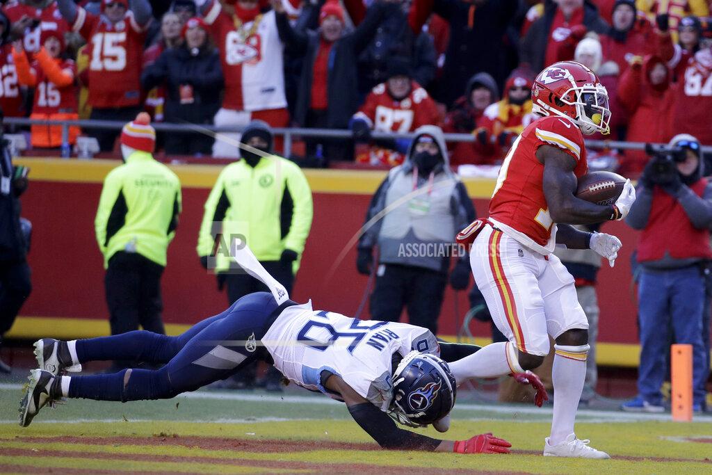 Charlie Riedel Kansas City Chiefs' Tyreek Hill catches a touchdown pass in front of Tennessee Titans' Logan Ryan (26) during the first half of the NFL AFC Championship football game Sunday, Jan. 19, 2020, in Kansas City, MO. (AP Photo/Charlie Riedel)