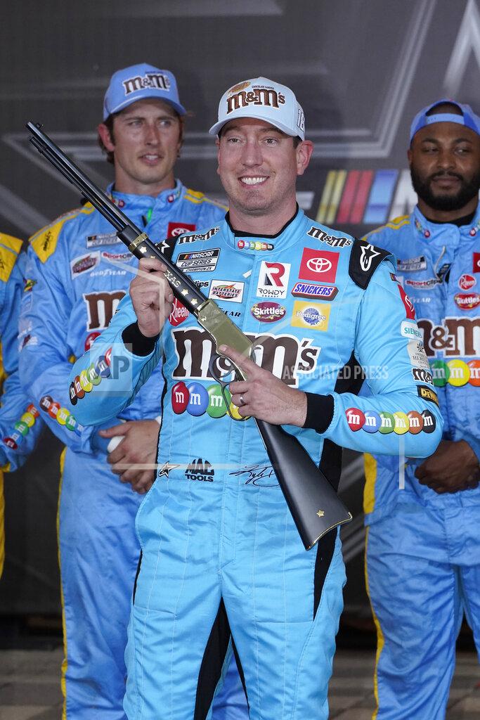 Larry Papke Kyle Busch holds the pole position award after qualifications for the NASCAR All-Star auto race at Texas Motor Speedway in Fort Worth, Texas, Saturday, May 21, 2022.(AP Photo/Larry Papke)