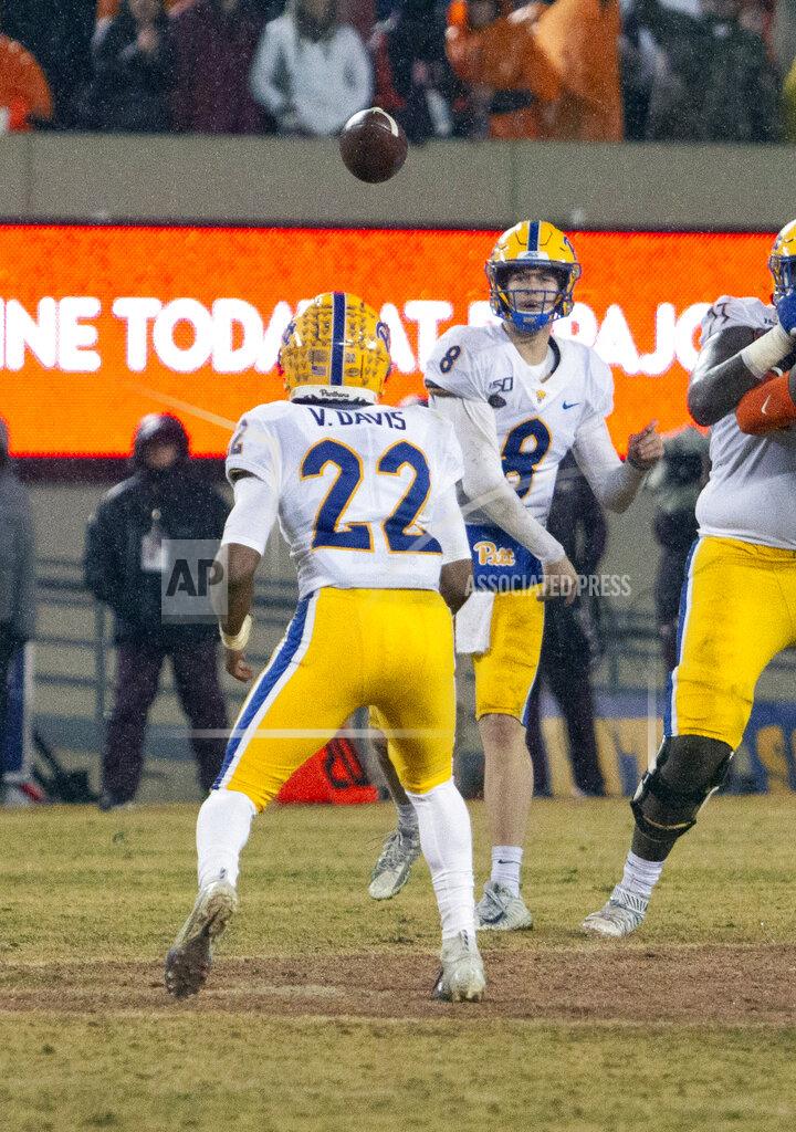 Matt Bell Pittsburgh quarterback Kenny Pickett makes a pass to running back Vincent Davis during an NCAA college football game against Virginia Tech in Blacksburg, Va., Saturday, Nov. 23, 2019. (AP Photo/Matt Bell)