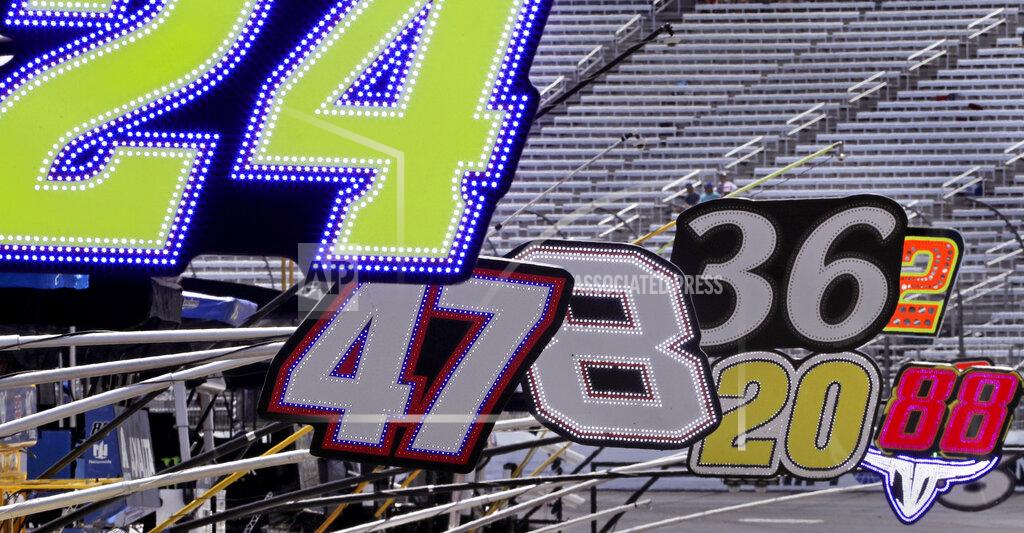 Charles Krupa Team car numbers hang out over pit lane prior to a NASCAR Cup Series auto race at New Hampshire Motor Speedway in Loudon, N.H., Sunday, July 21, 2019. (AP Photo/Charles Krupa)