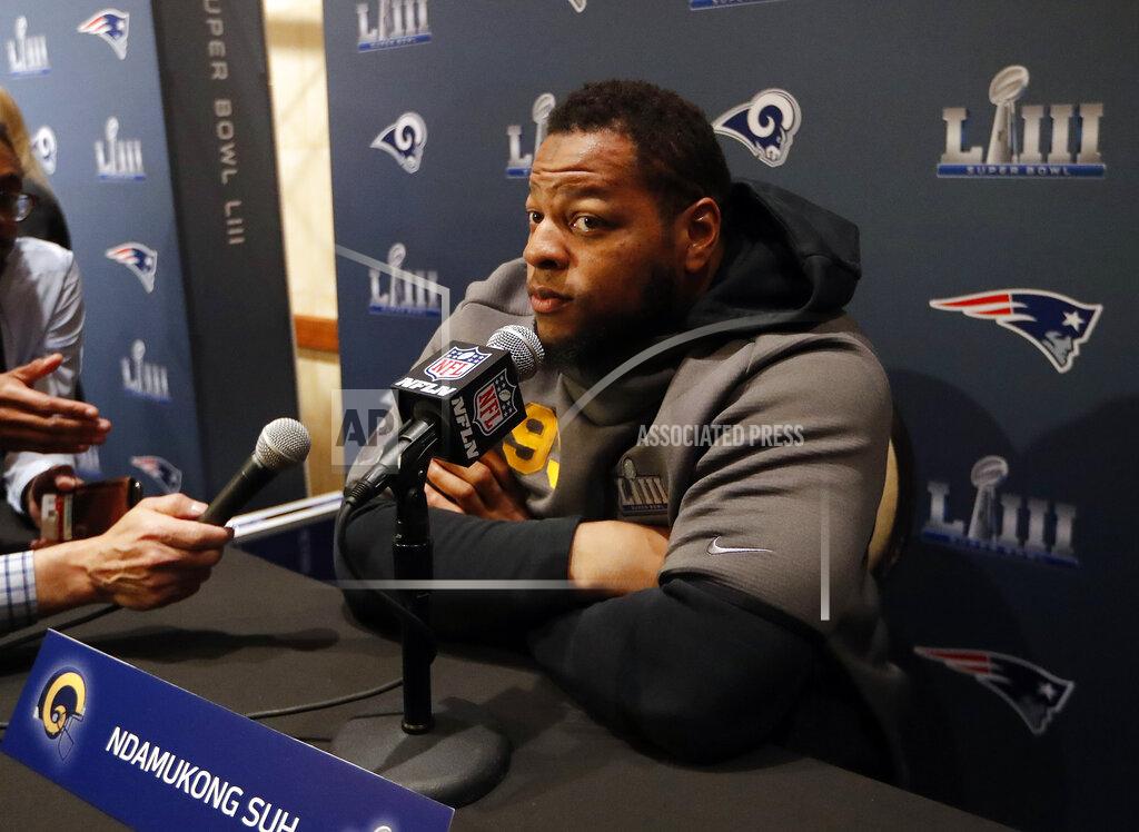 John Bazemore Los Angeles Rams defensive tackle Ndamukong Suh listens to question during a media availability Tuesday, Jan. 29, 2019, in Atlanta, ahead of the NFL Super Bowl 53 football game (AP Photo/John Bazemore)