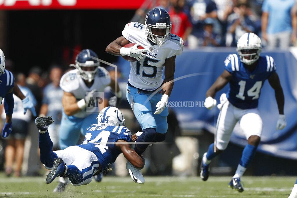 Wade Payne Tennessee Titans wide receiver Darius Jennings (15) is tripped up by Indianapolis Colts cornerback Rock Ya-Sin (34) in the first half of an NFL football game Sunday, Sept. 15, 2019, in Nashville, Tenn. (AP Photo/Wade Payne)