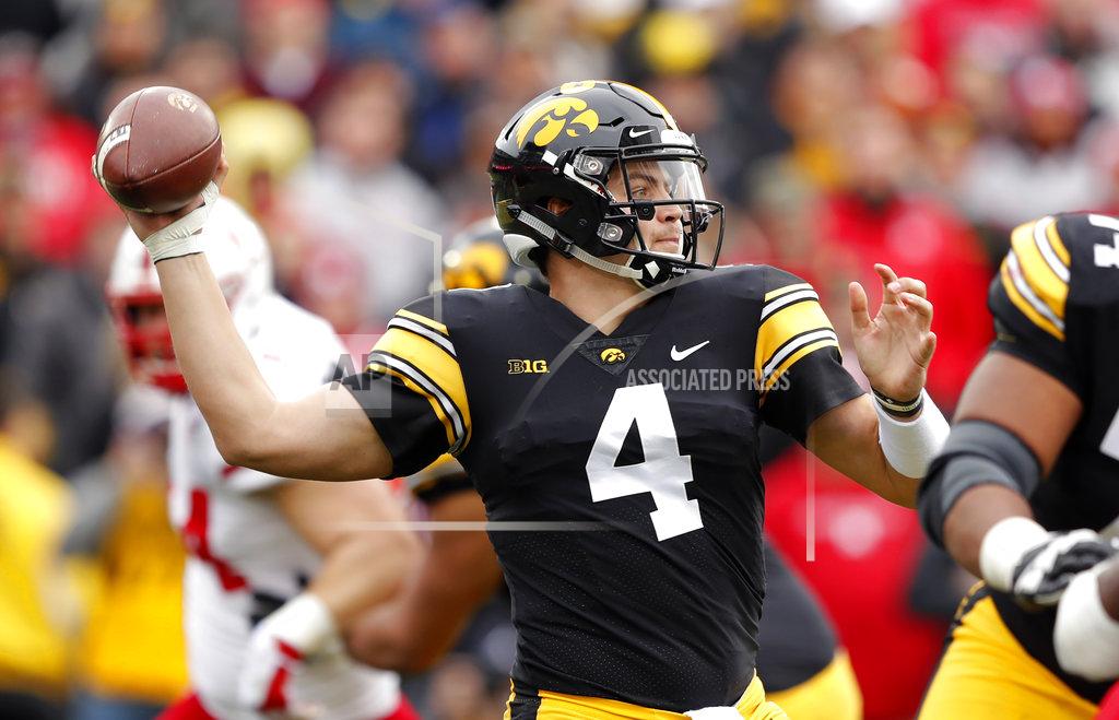 Charlie Neibergall Iowa quarterback Nate Stanley throws a pass during the first half of an NCAA college football game against Nebraska, Friday, Nov. 23, 2018, in Iowa City, Iowa. (AP Photo/Charlie Neibergall)