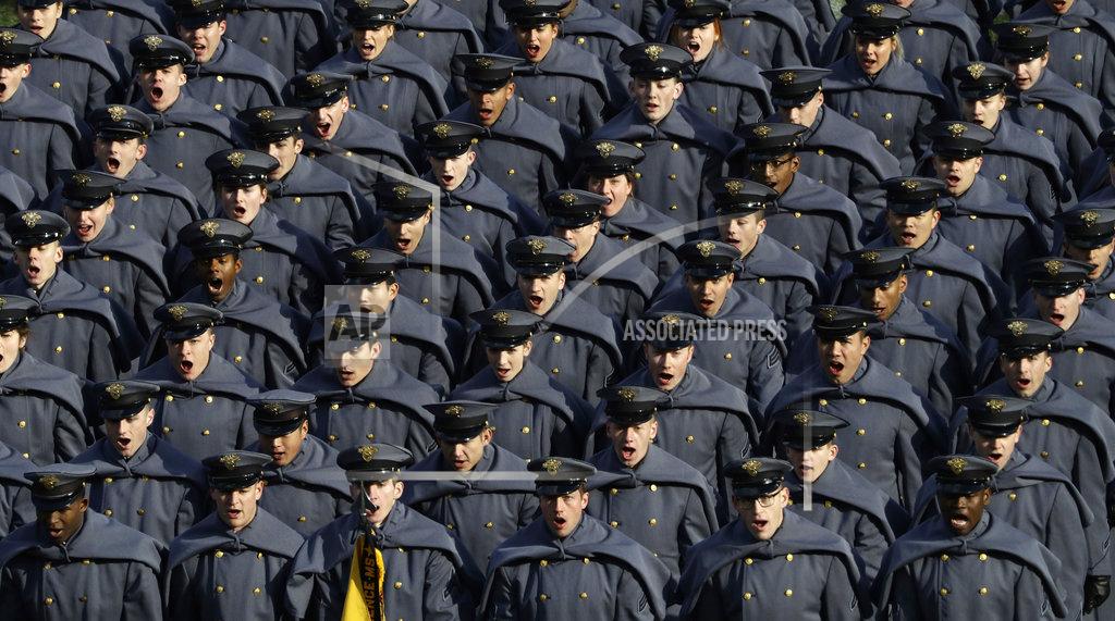 Matt Slocum Army cadets cheer after marching onto the field before an NCAA college football game against Navy, Saturday, Dec. 8, 2018, in Philadelphia. (AP Photo/Matt Slocum)