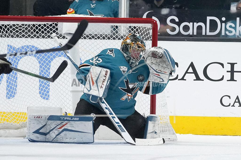Tony Avelar San Jose Sharks goaltender Josef Korenar (32) blocks a shot against the Colorado Avalanche during the first period of a hockey game in San Jose, Calif., on Wednesday, May 5, 2021. (AP Photo/Tony Avelar)