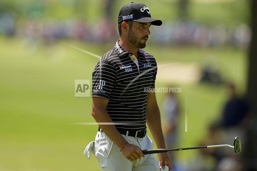 Eric Gay Abraham Ancer, of Mexico, walks off the green on the 13th hole during the first round of the PGA Championship golf tournament, Thursday, May 19, 2022, in Tulsa, Okla. (AP Photo/Eric Gay)