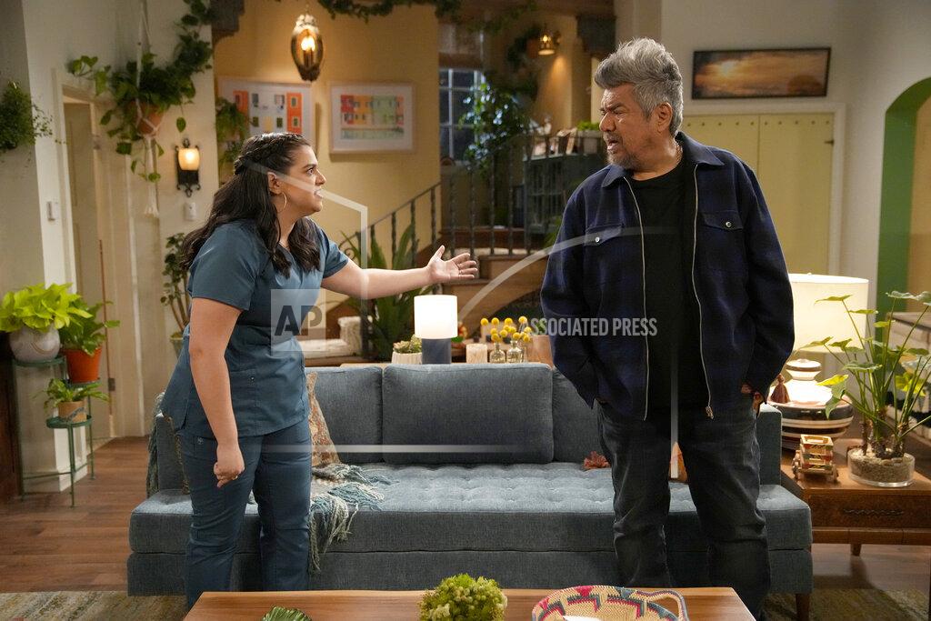Casey Durkin This image released by NBC shows Mayan Lopez, left, and George Lopez in a scene from "Lopez vs Lopez," a new comedy series debuting this fall. (Casey Durkin/NBC via AP)