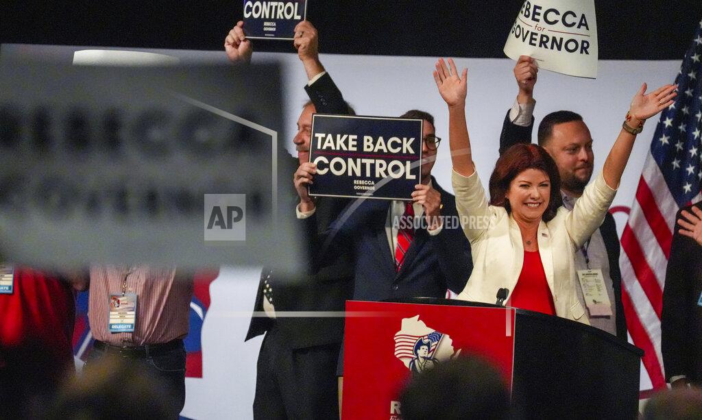 Ebony Cox Gubernatorial candidate and former Lt. Gov. Rebecca Kleefisch acknowledges the audience during the Republican State Convention in Middleton, Wis., Saturday, May 21, 2022. (Ebony Cox/Milwaukee Journal-Sentinel via AP)