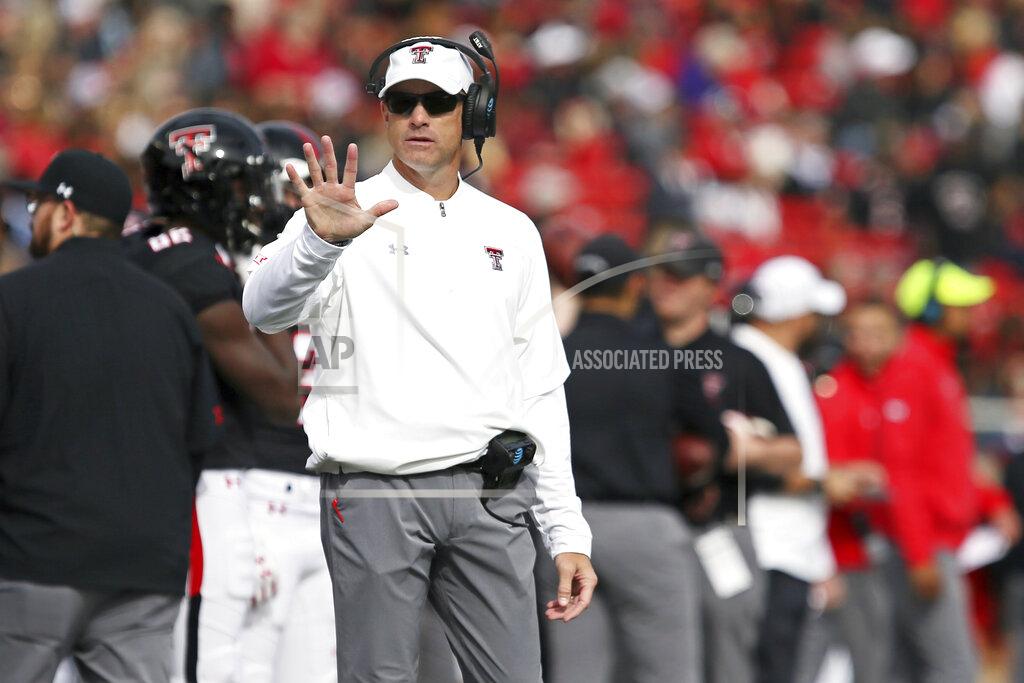 Sam Grenadier Texas Tech coach Matt Wells talks to a referee during the first half of an NCAA college football game against TCU, Saturday, Nov. 16, 2019, in Lubbock, Texas. (Sam Grenadier/Lubbock Avalanche-Journal via AP)