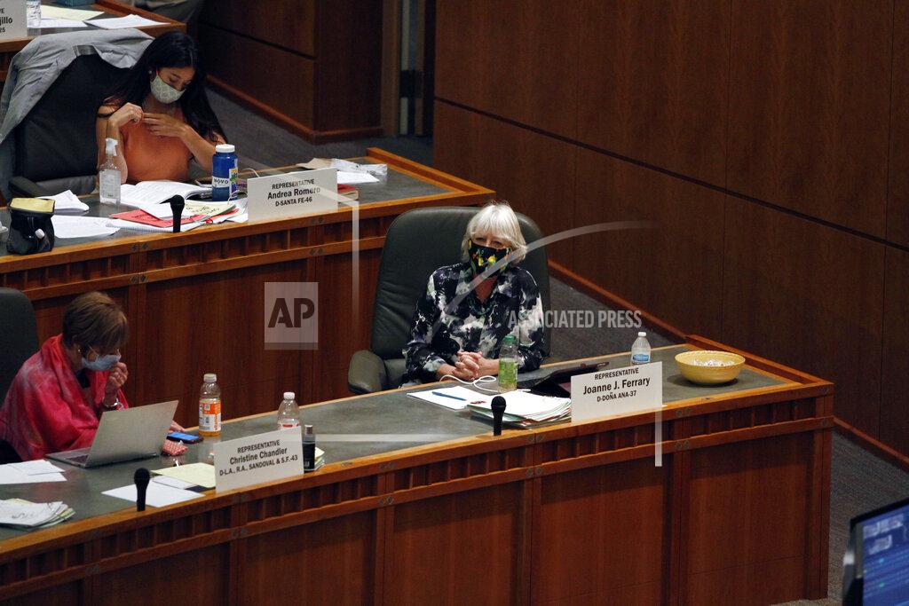 Cedar Attanasio In this Monday, June 22, 2020 photo, Democratic state Rep. Joanne Ferrary, of Las Cruces, listens during a special session of the House shortly after closed-door caucus meeting in Santa Fe, N.M. Ferrary supported a non-binding resolution calling on Democratic Gov. Michelle Lujan Grisham to drop her motion to dismiss the Martinez/Yazzie education lawsuit. It didn't make it to the floor. (AP Photo/Cedar Attanasio)
