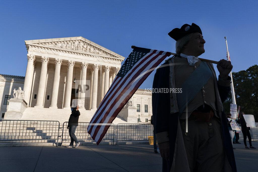 Jacquelyn Martin James Manship, playing George Washington, rallies in support of the nomination Amy Coney Barrett to the Supreme Court, outside the Supreme Court, Monday, Oct. 26, 2020, on Capitol Hill in Washington. (AP Photo/Jacquelyn Martin)