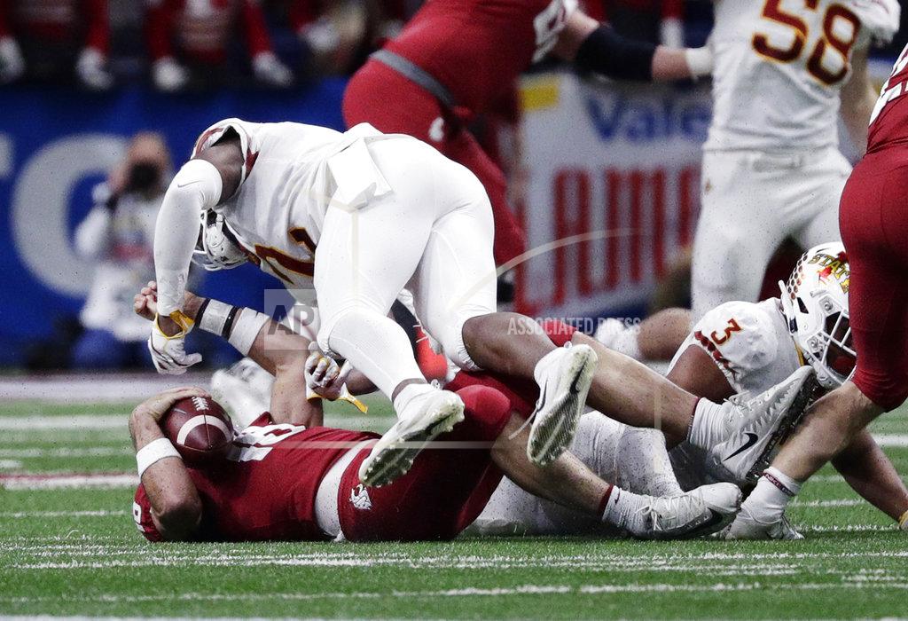Eric Gay Washington State quarterback Gardner Minshew (16) is hit by Iowa State linebacker Willie Harvey (2) during the the first half of the Alamo Bowl NCAA college football game, Friday, Dec. 28, 2018, in San Antonio. Harvey was called for targeting and ejected from the game. (AP Photo/Eric Gay)