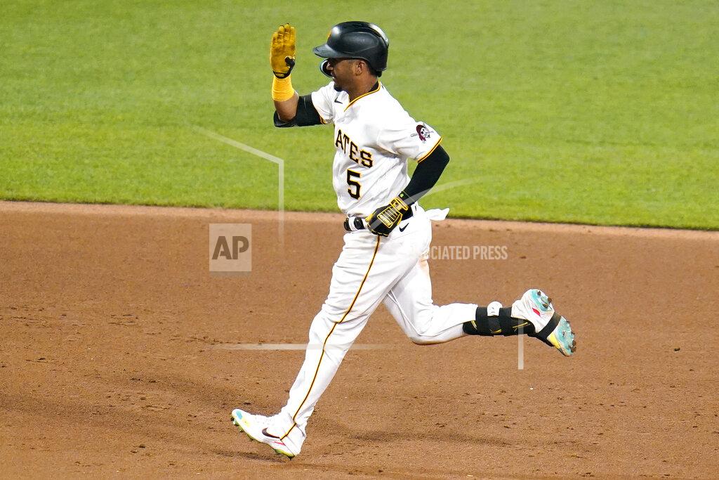 Gene J. Puskar Pittsburgh Pirates' Michael Perez runs the bases after hitting a solo home run off Milwaukee Brewers relief pitcher Jandel Gustave during the eighth inning of a baseball game in Pittsburgh, Thursday, June 30, 2022. It was the third home run of the game for Perez. (AP Photo/Gene J. Puskar)