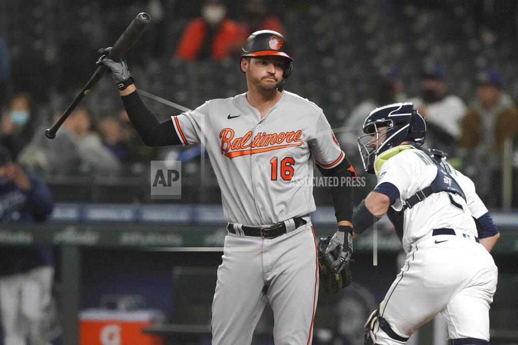 Ted S. Warren Baltimore Orioles' Trey Mancini (16) reacts after striking out swinging during the third inning of a baseball game against the Seattle Mariners, Monday, May 3, 2021, in Seattle. (AP Photo/Ted S. Warren)