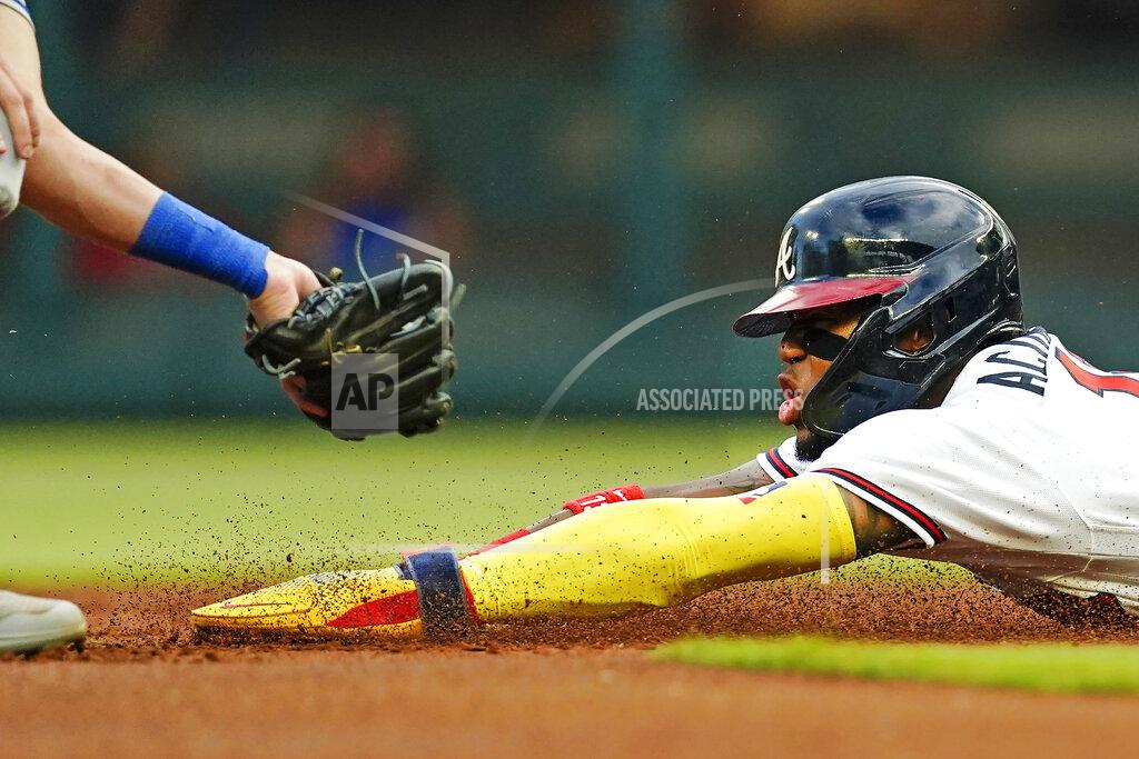 John Bazemore Atlanta Braves' Ronald Acuña Jr. is staged out as he attempts to steal second base during the first inning of the team's baseball game against the New York Mets on Tuesday, Aug. 16, 2022, in Atlanta. (AP Photo/John Bazemore)