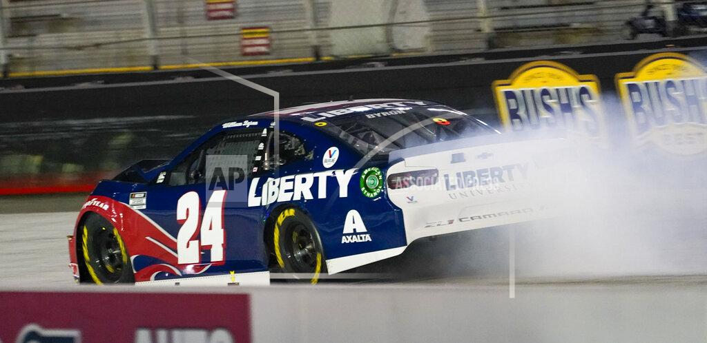 Steve Helber William Byron's car leaves a trail of smoke after an accident during the NASCAR Cup Series auto race Saturday, Sept. 19, 2020, in Bristol, Tenn. (AP Photo/Steve Helber)