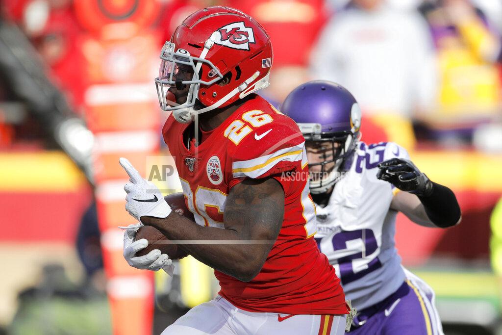 Colin E. Braley Kansas City Chiefs running back Damien Williams (26) gestures as he runs for a 91-yard touchdown against Minnesota Vikings safety Harrison Smith (22), during the second half of an NFL football game in Kansas City, Mo., Sunday, Nov. 3, 2019. (AP Photo/Colin E. Braley)